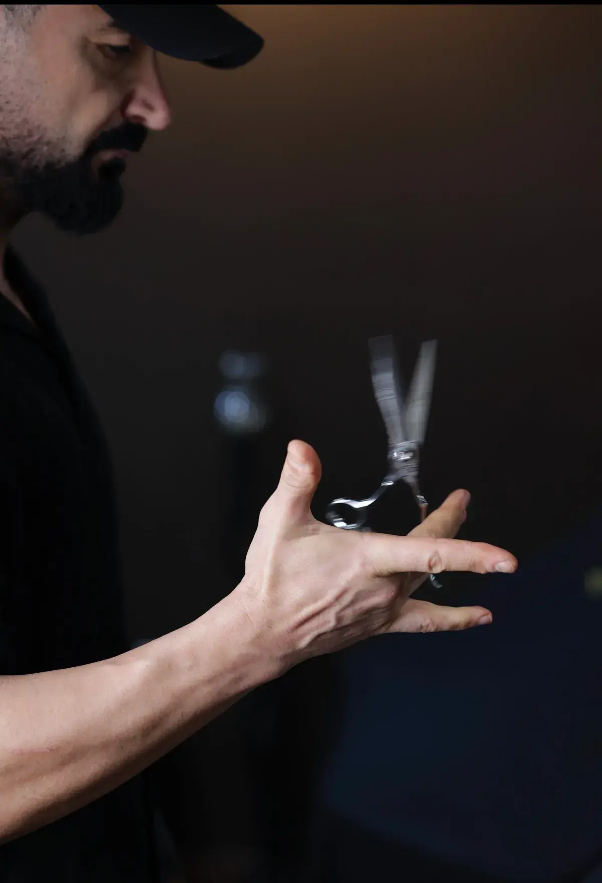 Picasso Academy barber demonstrating scissor handling